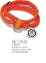 BRACCIALE CON CORDONCINO ELASTICIZZATO E PERLA DI VETRO.- ANTICA